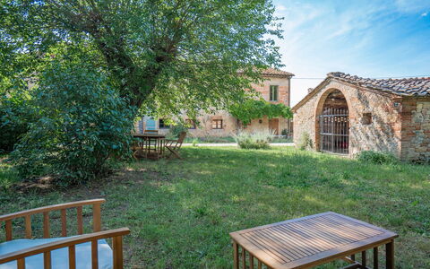 Il Palazzetto Francigena, Monteriggioni: Plant, Property, Building, Furniture, Cloud, Window, Sky, Table, Wood, Natural Landscape