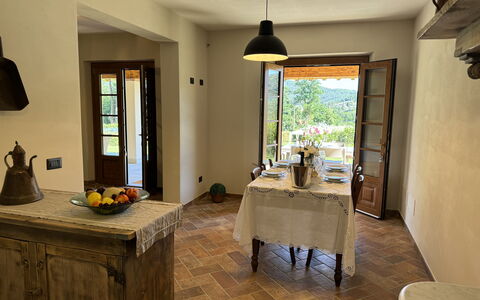 Casa Viviani: Table, Property, Furniture, Cabinetry, Window, Wood, Plant, Lighting, Houseplant, Kitchen