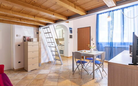 Florentine Careggi Loft: Table, Property, Furniture, Building, Window, Wood, Door, Interior Design, Flooring, House