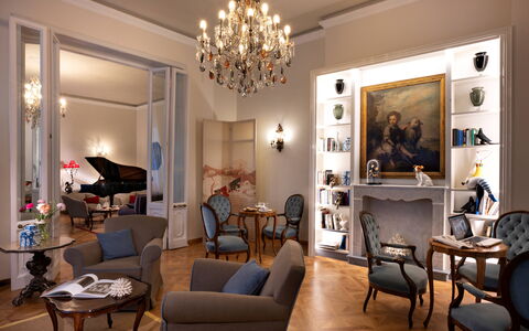 Butterfly With Beach & Breakfast Included: Furniture, Table, Picture Frame, Property, Chair, Lighting, Living Room, Interior Design, Floor, Lamp