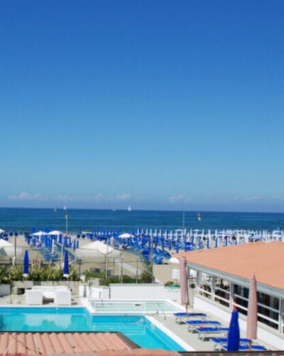 Butterfly With Beach & Breakfast Included: Water, Sky, Cloud, Plant, Coastal And Oceanic Landforms, Swimming Pool, Beach, Leisure, Tree, Horizon