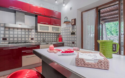 Santa Colomba House, Siena, Nature And Pool: Cabinetry, Property, Countertop, Kitchen, Table, Interior Design, Wood, Lighting, Flooring, Architecture