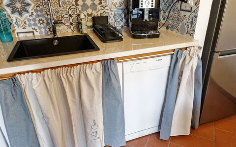 Villa Chicco: Laundry Room, Cabinetry, Shelf, Shelving, Clothes Hanger, Flooring, Wood, Kitchen, Table, Hardwood