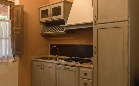 Borgo Dolciano: Cabinetry, Countertop, Furniture, Building, Drawer, Kitchen, Wood, Kitchen Stove, Interior Design, Flooring