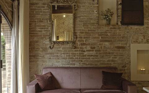 Borgo Dolciano: Brown, Furniture, Couch, Wood, Interior Design, Rectangle, Flooring, Floor, Living Room, Hardwood