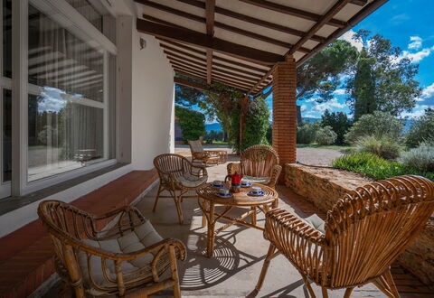 Poggetti San Luigi Country Home Follonica: Plant, Furniture, Table, Property, Chair, Shade, Outdoor Furniture, Wood, Sky, Tree