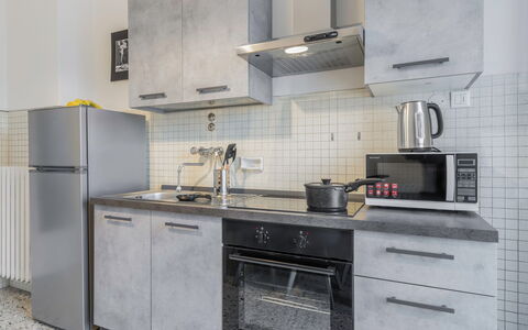 Romina Apartment, Florence, Campo Marte: Kitchen, Kitchen Appliance, Countertop, Major Appliance, Kitchen Stove, Flooring, Cabinetry, Home Appliance, Interior Design, Furniture