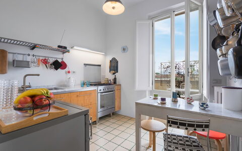 Orto Botanico Apartment With Terrace And Dome View: Furniture, Property, Cabinetry, Countertop, Table, Kitchen, Interior Design, Wood, Kitchen Stove, Floor