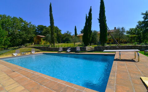 Villa Il Troscione: Blue, Swimming Pool, Shade, Garden, Landscaping, Resort, Outdoor Furniture, Water Feature, Hacienda, Backyard