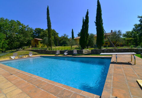 Villa Il Troscione: Blue, Swimming Pool, Shade, Garden, Landscaping, Resort, Outdoor Furniture, Water Feature, Hacienda, Backyard