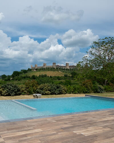 Le Volte, Borgo Campassini, Monteriggioni: Swimming Pool, Garden, Flagstone, Landscaping, Shade, Wood Flooring, Walkway, Backyard, Outdoor Furniture, Tile