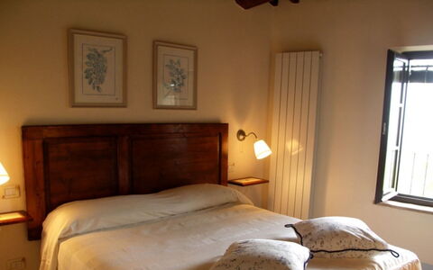 Borgo di Fighine: Bed, Furniture, Bedroom, Bedding, Bed Sheet, Wall, Interior Design, Wood, Floor, Flooring