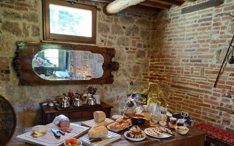 Podere della Bruciata: Furniture, Interior Design, Table, Chair, Room, Brick, Picture Frame, Food, Restaurant, Houseplant