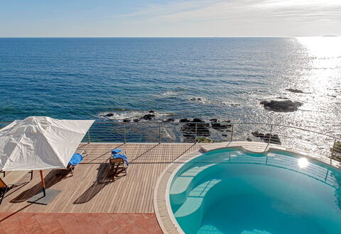 Villa Baia al Mare: Blue, Water, Body Of Water, Swimming Pool, Sea, Outdoor Furniture, Coastal And Oceanic Landforms, Resort, Coast, Ocean