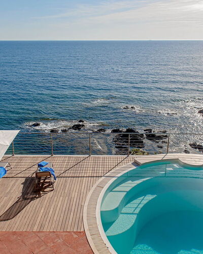 Villa Baia al Mare: Blue, Water, Body Of Water, Swimming Pool, Sea, Outdoor Furniture, Coastal And Oceanic Landforms, Resort, Coast, Ocean