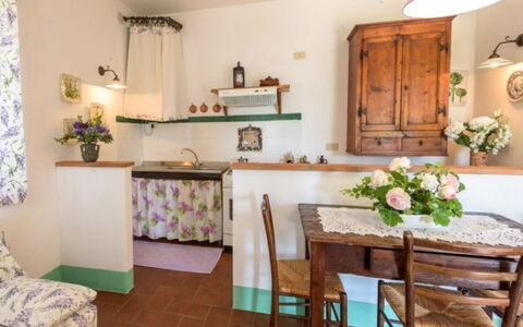 Podere del Mezzadro: Furniture, Interior Design, Flooring, Wood, Room, Floor, Lighting, Ceiling, Table, Kitchen