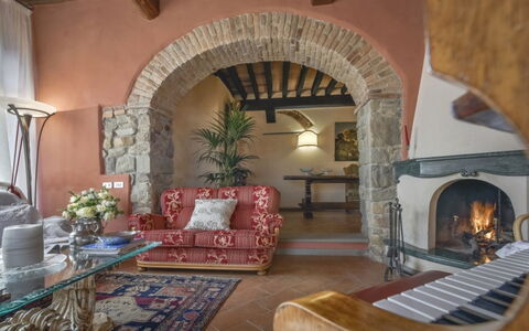 Villa Lucente: Furniture, Wall, Interior Design, Flooring, Lighting, Floor, Chair, Ceiling, Table, Living Room