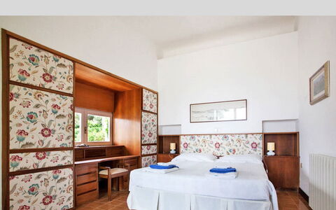 Terrazza Dell'Elba: Interior Design, Flooring, Floor, Furniture, Bedroom, Room, Ceiling, Bed, Apartment, Bed Sheet