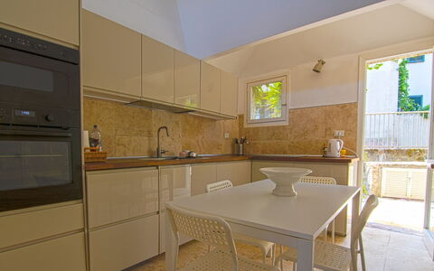 Terrazza Dell'Elba: Kitchen, Interior Design, Countertop, Flooring, Major Appliance, Wood, Kitchen Appliance, Furniture, Floor, Cabinetry