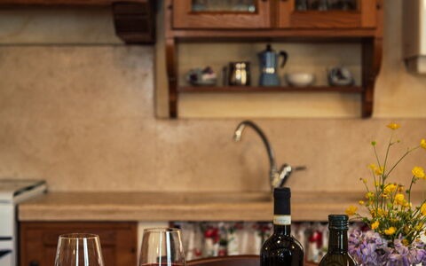 La Pergola: Bottle, Furniture, Tableware, Countertop, Interior Design, Wine Bottle, Table, Glass Bottle, Food