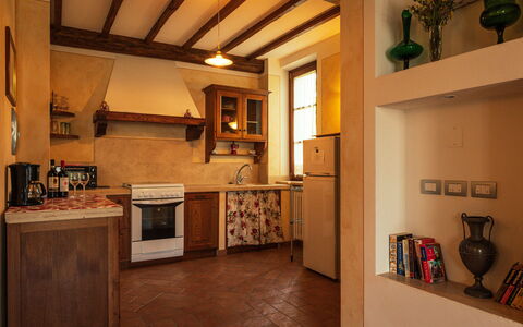 Il Roseto: Furniture, Interior Design, Flooring, Kitchen, Wood, Cabinetry, Countertop, Ceiling, Floor, Light Fixture