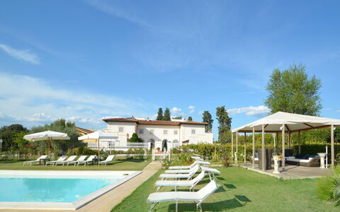 Villa Yvonne: Swimming Pool, Resort, Outdoor Furniture, Garden, Sunlounger, Lawn, Landscaping, Yard, Shade, Chair