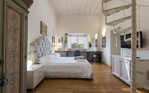 Villa Yvonne: Furniture, Interior Design, Bed, Flooring, Wall, Bedroom, Floor, Ceiling, Wood, Room