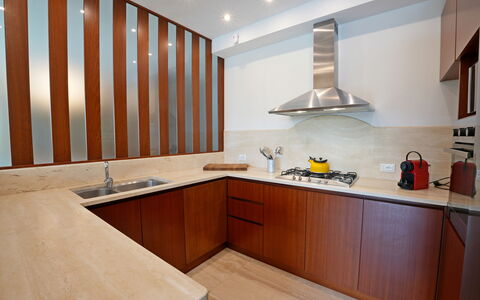 Villa Alex: Kitchen, Flooring, Countertop, Wood, Interior Design, Kitchen Appliance, Cabinetry, Floor, Ceiling, Major Appliance