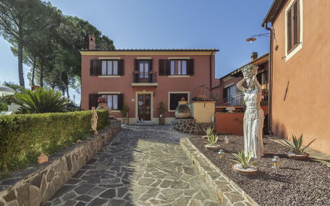 Casale La Pieve: Flowerpot, Home, Door, Landscaping, Estate, Driveway, Garden, Hacienda, Houseplant, Flagstone