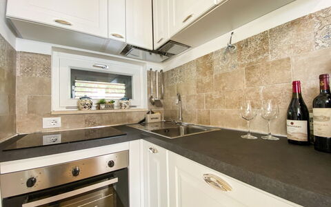 Il Tramonto: Kitchen, Countertop, Kitchen Appliance, Major Appliance, Interior Design, Flooring, Home Appliance, Plumbing Fixture, Cabinetry, Floor