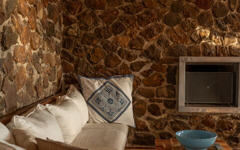 Villa Argentina: Stone Wall, Brown, Natural Material, Wood Stain, Hardwood, Living Room, Brick, Wallpaper, Tile, Pillow