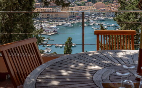 Ca' Nelly: Furniture, Chair, Outdoor Furniture, Eco Hotel, Balcony, Shade, Wood Stain, Outdoor Table, Hardwood, Deck