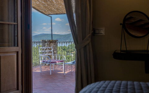 Villa Trasimena: Furniture, Balcony, Chair, Linens, Outdoor Furniture, Shade, Bedroom, Bedding, Bed, Fence