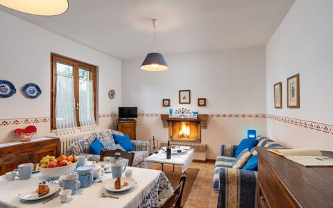 Podere Oliveta: Furniture, Interior Design, Flooring, Room, Lighting, Ceiling, Home, Floor, Picture Frame, Living Room