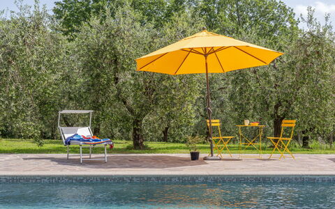 Il Querceto: Outdoor Furniture, Furniture, Umbrella, Swimming Pool, Shade, Chair, Garden, Resort, Sunlounger, Leisure
