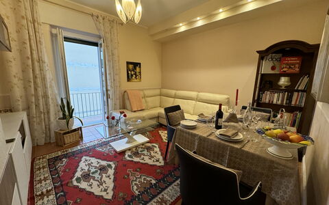 Sto Bene Qua: Furniture, Interior Design, Flooring, Floor, Wood, Room, Ceiling, Table, Couch, Living Room