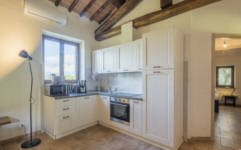 Cottage Monti Pet Friendly With Shared Pool: Furniture, Interior Design, Flooring, Wood, Ceiling, Kitchen Appliance, Cabinetry, Room, Floor, Kitchen