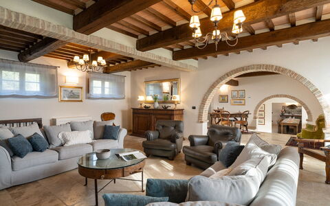 Villa Cortona: Eco-Sustainable Luxury Estate with: Furniture, Interior Design, Couch, Wall, Flooring, Wood, Ceiling, Table, Room, Living Room