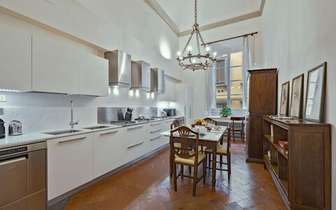 Elegant Suite: Florence Apartment with View on Med: Kitchen, Flooring, Interior Design, Wood, Furniture, Countertop, Ceiling, Kitchen Appliance, Floor, Cabinetry