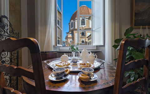 Elegant Suite: Florence Apartment with View on Med: Furniture, Interior Design, Tableware, Table, Serveware, Room, Picture Frame, Dishware, Dining Room, Porcelain