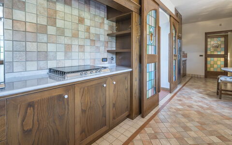 Villa Alessia Luxury: Flooring, Interior Design, Wood, Kitchen, Countertop, Floor, Ceiling, Cabinetry, Lighting, Furniture