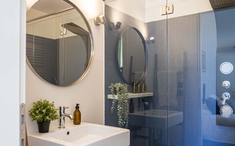 Green Suite Florence: Bathroom, Plumbing Fixture, Interior Design, Mirror, Bathroom Sink, Flooring, Floor, Sink, Light Fixture, Lighting