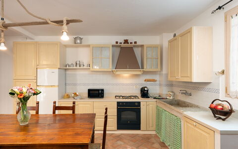 Villa Gori: Furniture, Kitchen, Countertop, Interior Design, Cabinetry, Kitchen Appliance, Flooring, Floor, Wood, Major Appliance