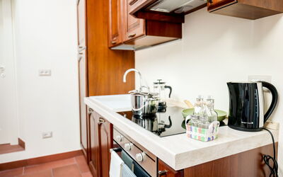 Appartamento Etruria: Kitchen Appliance, Kitchen, Countertop, Major Appliance, Cabinetry, Wood, Furniture, Interior Design, Flooring, Small Appliance