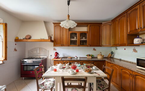 Villa Fornaci: Furniture, Kitchen, Interior Design, Cabinetry, Wood, Countertop, Flooring, Kitchen Appliance, Room, Cupboard