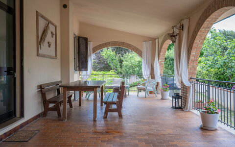 Il Campino, Pool, Montaione: Furniture, Chair, Ceiling, Porch, Wood Stain, Kitchen & Dining Room Table, Shade, Hacienda, Resort, Outdoor Furniture