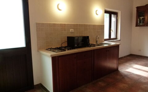 Casa Salvia, Ac, Wifi, Narni: Flooring, Wood, Interior Design, Countertop, Floor, Kitchen, Furniture, Lighting, Kitchen Appliance, Brown