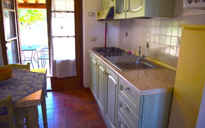 Nido: Kitchen, Countertop, Wood, Flooring, Furniture, Interior Design, Kitchen Appliance, Kitchen Sink, Floor, Major Appliance