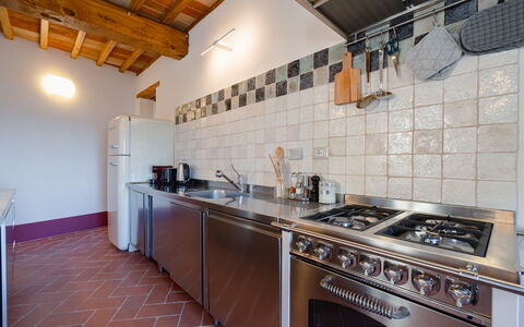 Mensano Old Town Apartment: Kitchen, Flooring, Kitchen Appliance, Countertop, Major Appliance, Ceiling, Floor, Kitchen Stove, Gas Stove, Stove