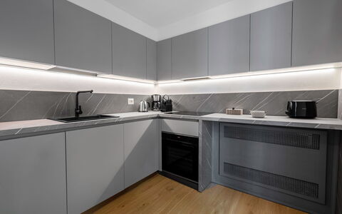 Elegant Apartments Near the Duomo: Kitchen, Major Appliance, Kitchen Appliance, Kitchen Stove, Countertop, Home Appliance, Cabinetry